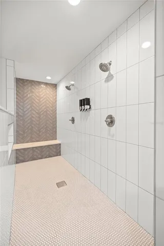 a bedroom with a bed a table and painting