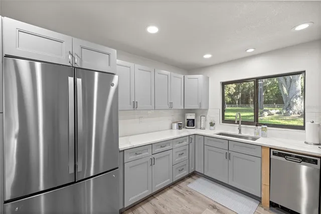 a view of a living room and a livingroom with furniture