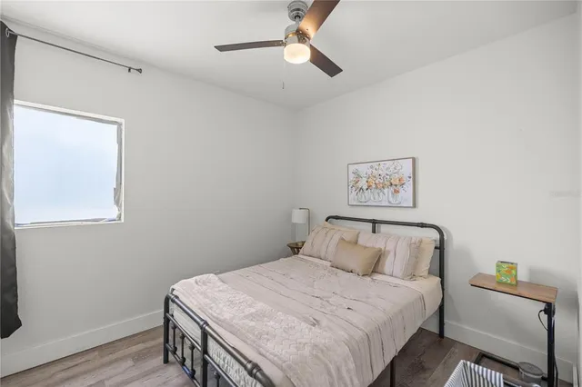 a view of a house with a tub and a yard