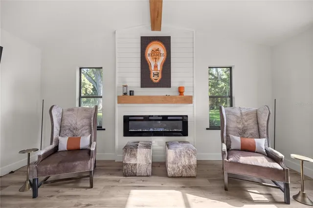 a bedroom with furniture or couch and a view of bedroom