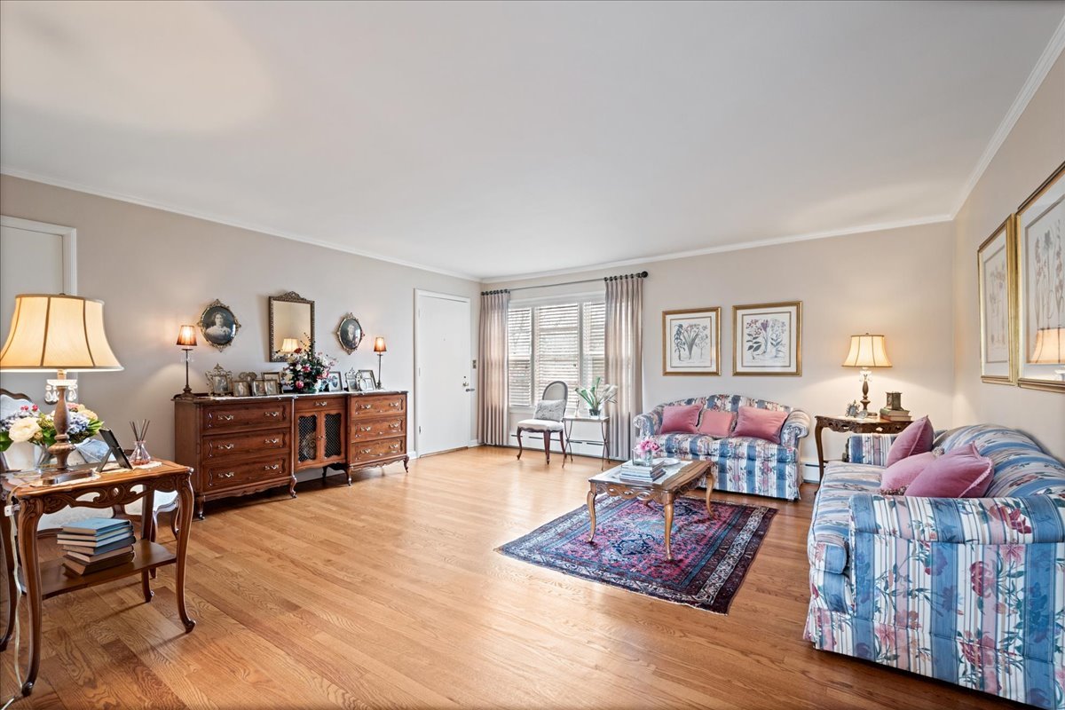 2234 Central Street, Unit 3 Evanston, IL 60201 - Photo 3 of 19 a living room with furniture and wooden floor