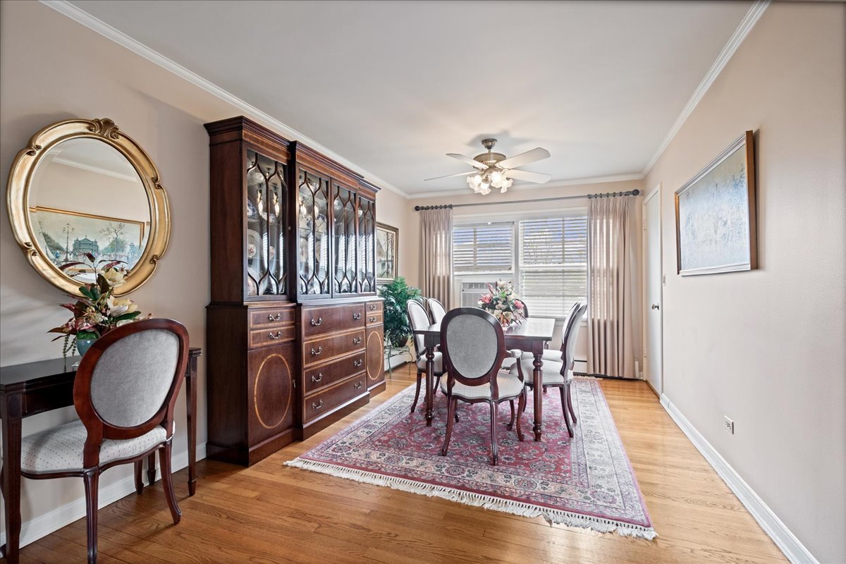 2234 Central Street, Unit 3 Evanston, IL 60201 - Photo 5 of 19 a view of a a dining room with furniture window and wooden floor