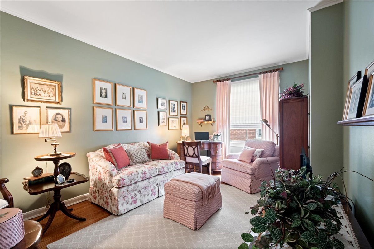 2234 Central Street, Unit 3 Evanston, IL 60201 - Photo 10 of 19 a living room with furniture flower pot and a window