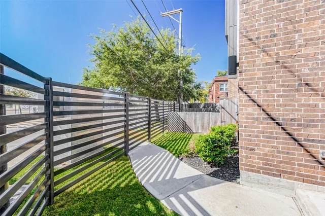 a view of a backyard with sitting area
