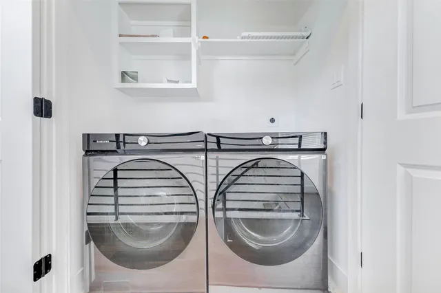 a front view of a house with a garage