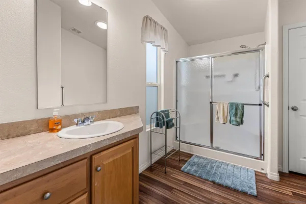 a bathroom with a sink and a mirror