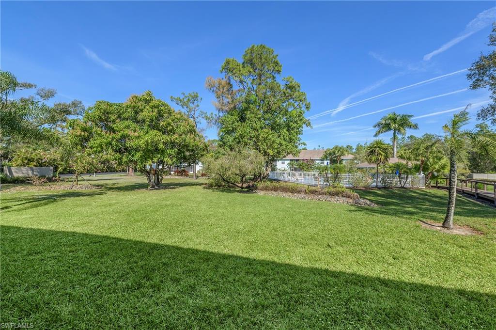 5737 Whitaker Road, Unit C103 Naples, FL 34112 - Photo 21 of 22 a view of green field