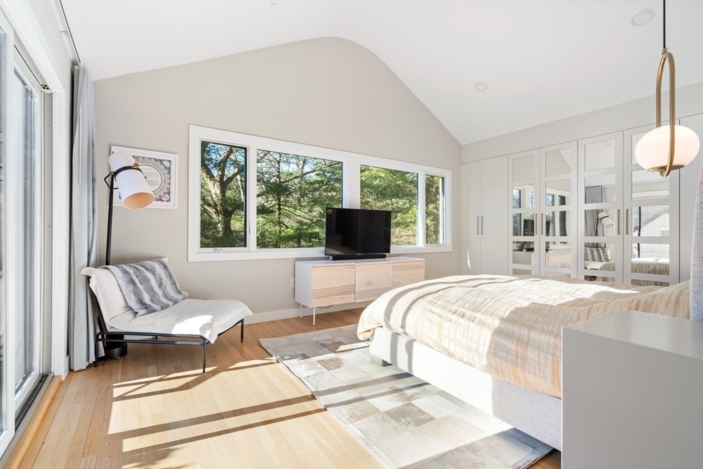 9 Newbrook Circle Newton, MA 02467 - Photo 14 of 28 a bedroom with a bed and a large window