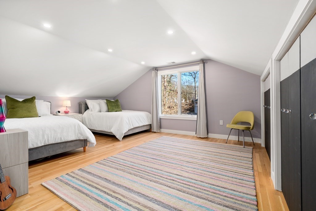 9 Newbrook Circle Newton, MA 02467 - Photo 18 of 28 a bedroom with two beds and a window