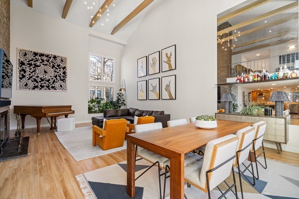 9 Newbrook Circle Newton, MA 02467 - Photo 4 of 28 a view of a dining room with furniture and wooden floor