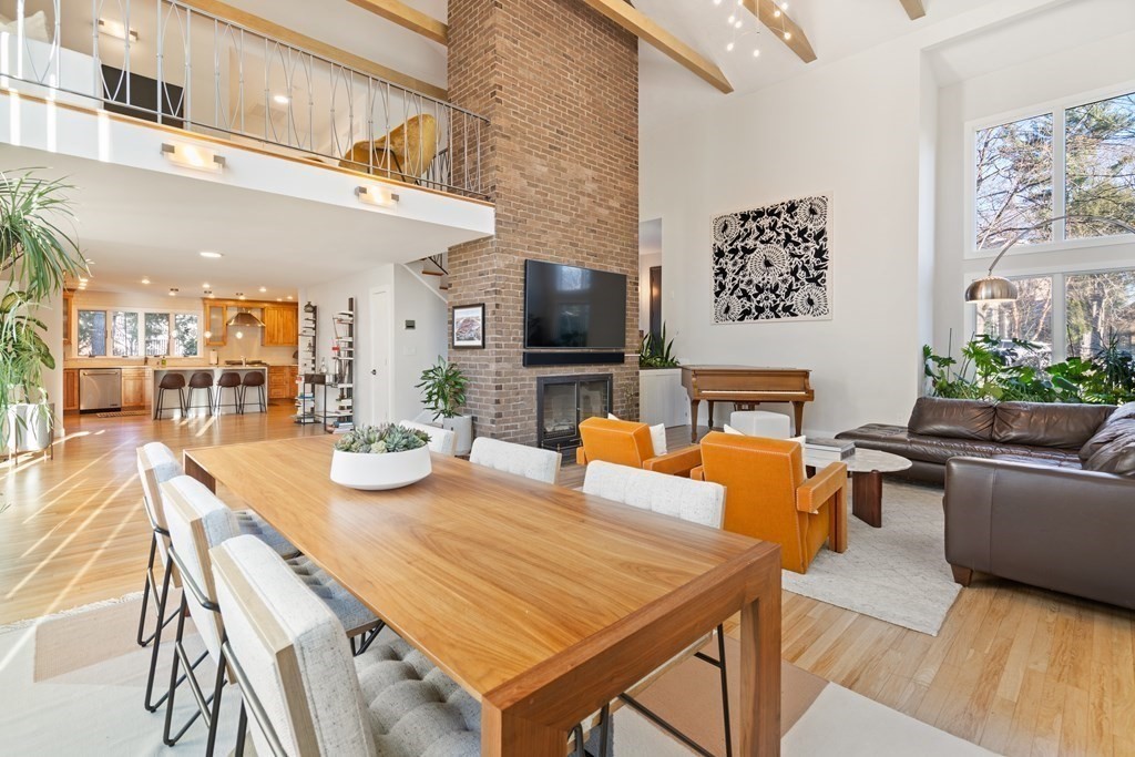 9 Newbrook Circle Newton, MA 02467 - Photo 7 of 28 a view of a dining room with furniture and a kitchen