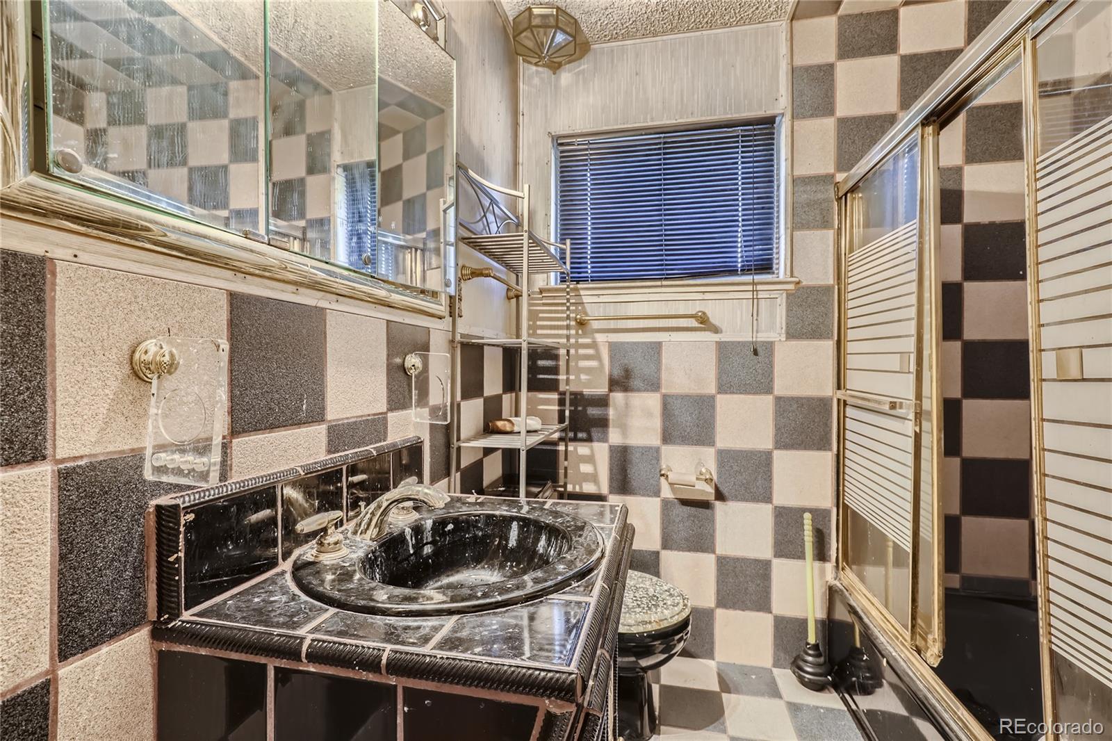 3550 Eudora Street Denver, CO 80207 - Photo 6 of 19 a kitchen with a stove and a sink
