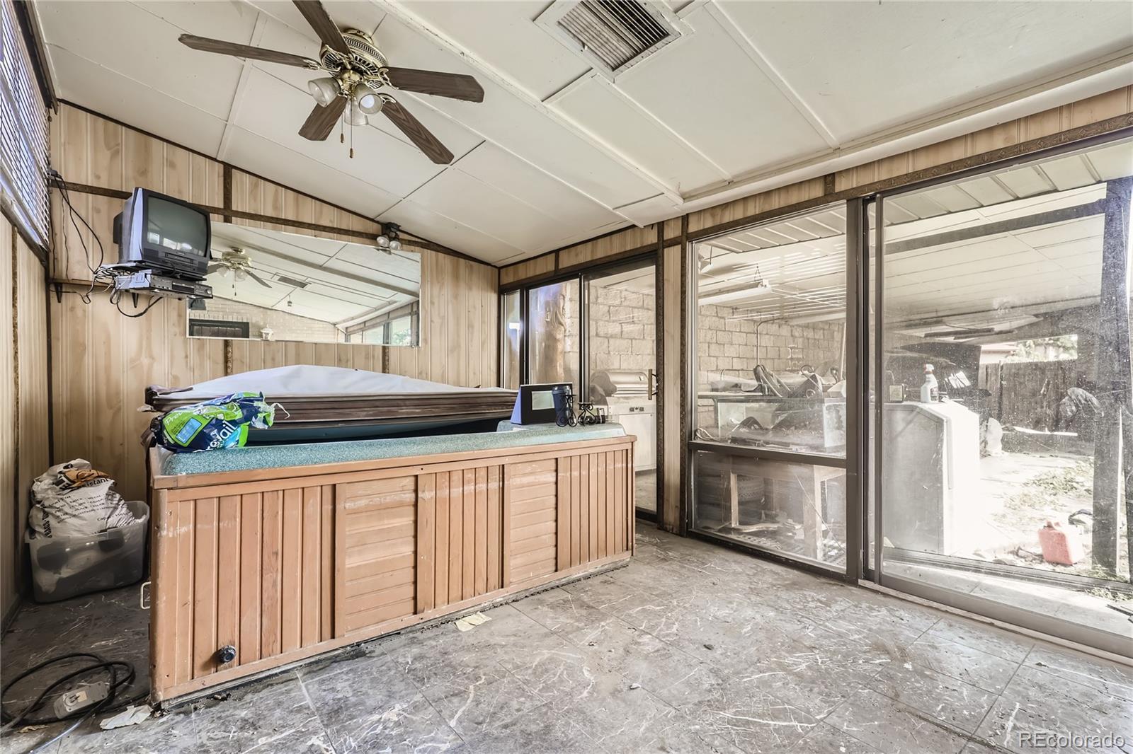3550 Eudora Street Denver, CO 80207 - Photo 10 of 19 a open kitchen with stainless steel appliances granite countertop a stove and a refrigerator
