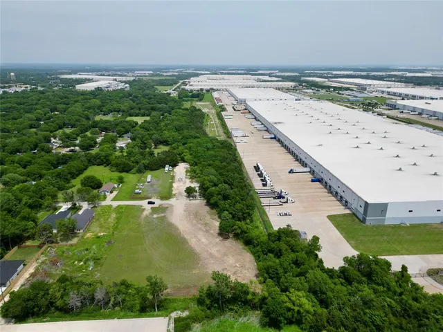 an aerial view of beach and ocean