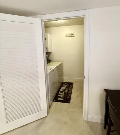 a view of bathroom and utility room
