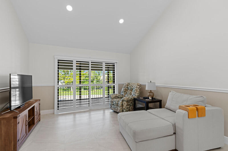 702 Wingfoot Drive, Unit D Jupiter, FL 33458 - Photo 18 of 39 Livingroom