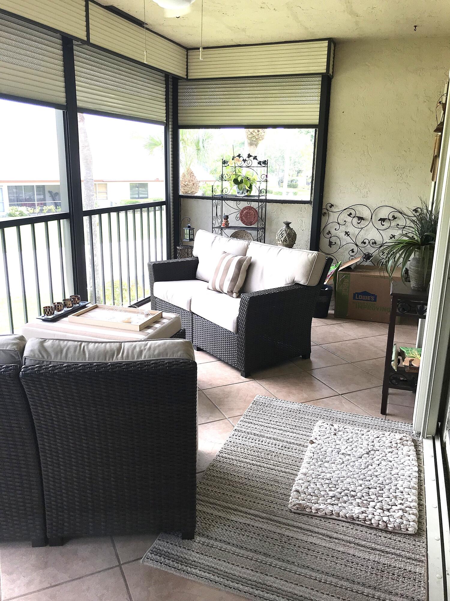 702 Wingfoot Drive, Unit D Jupiter, FL 33458 - Photo 29 of 39 Balcony with furniture 1