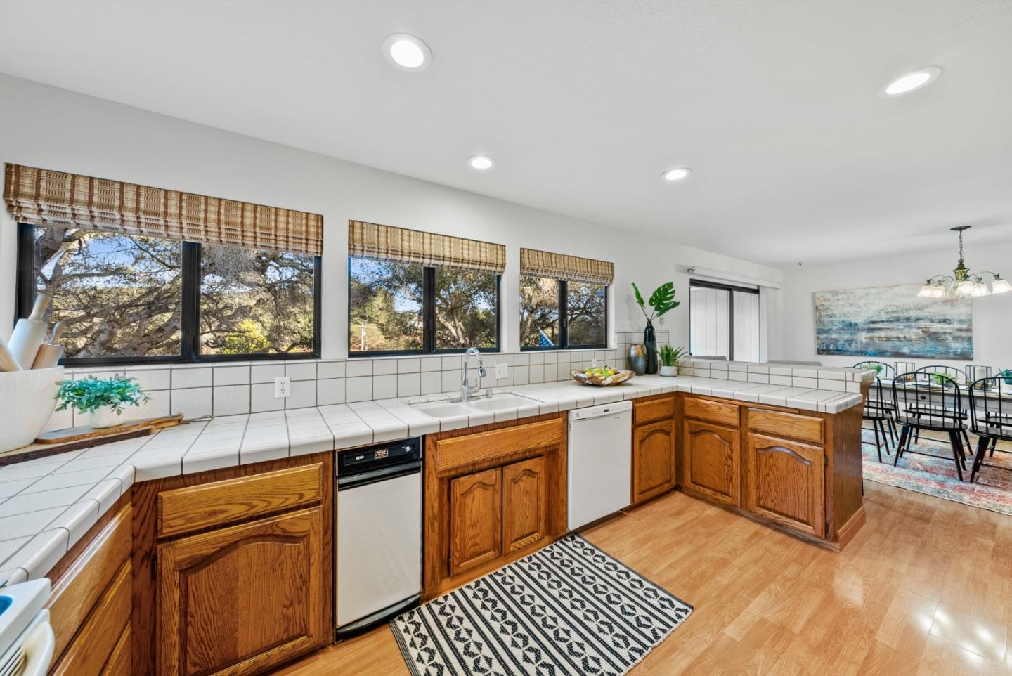 8935 Coker Road Salinas, CA 93907 - Photo 17 of 90 a kitchen with stainless steel appliances granite countertop a stove and cabinets