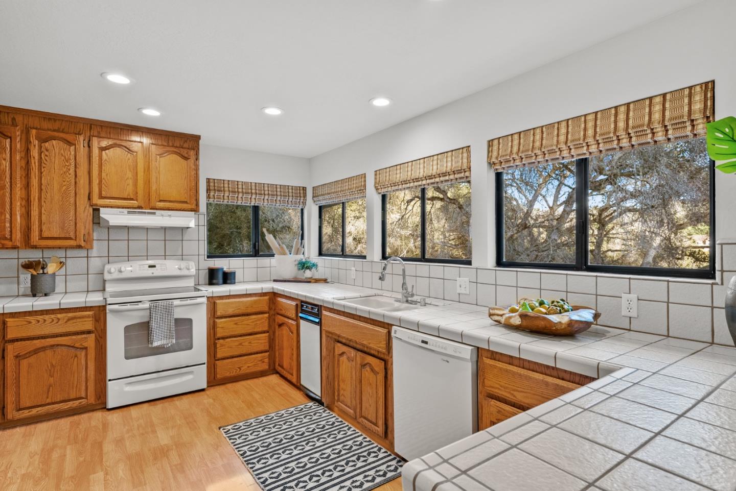 8935 Coker Road Salinas, CA 93907 - Photo 18 of 90 a kitchen with stainless steel appliances granite countertop a sink and cabinets