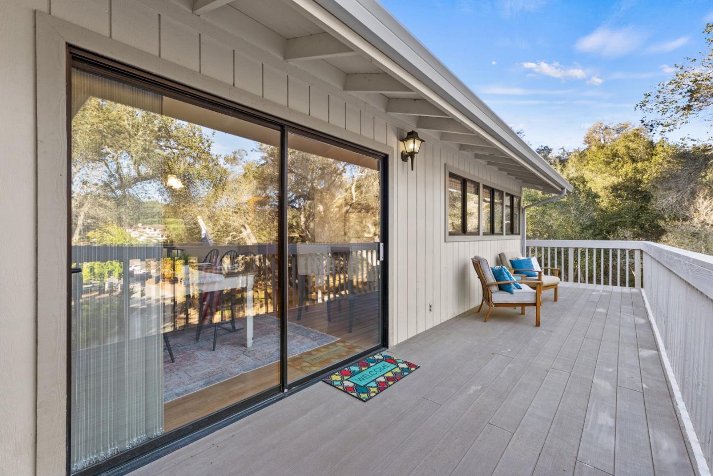 8935 Coker Road Salinas, CA 93907 - Photo 35 of 90 a balcony with chairs and wooden floor