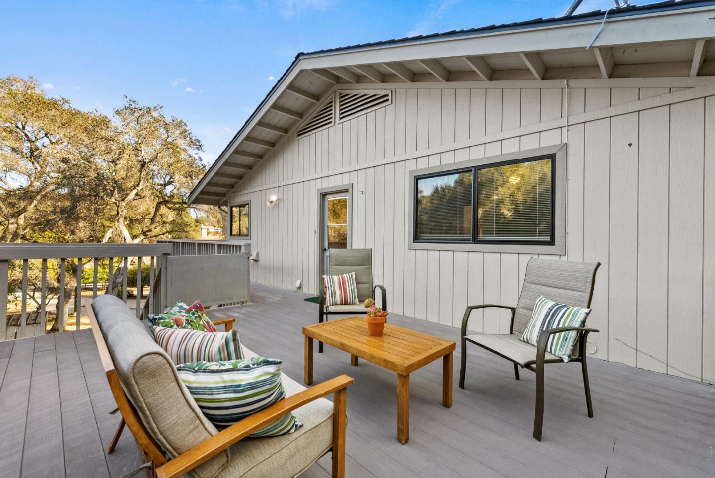 8935 Coker Road Salinas, CA 93907 - Photo 36 of 90 a balcony with furniture and wooden floor