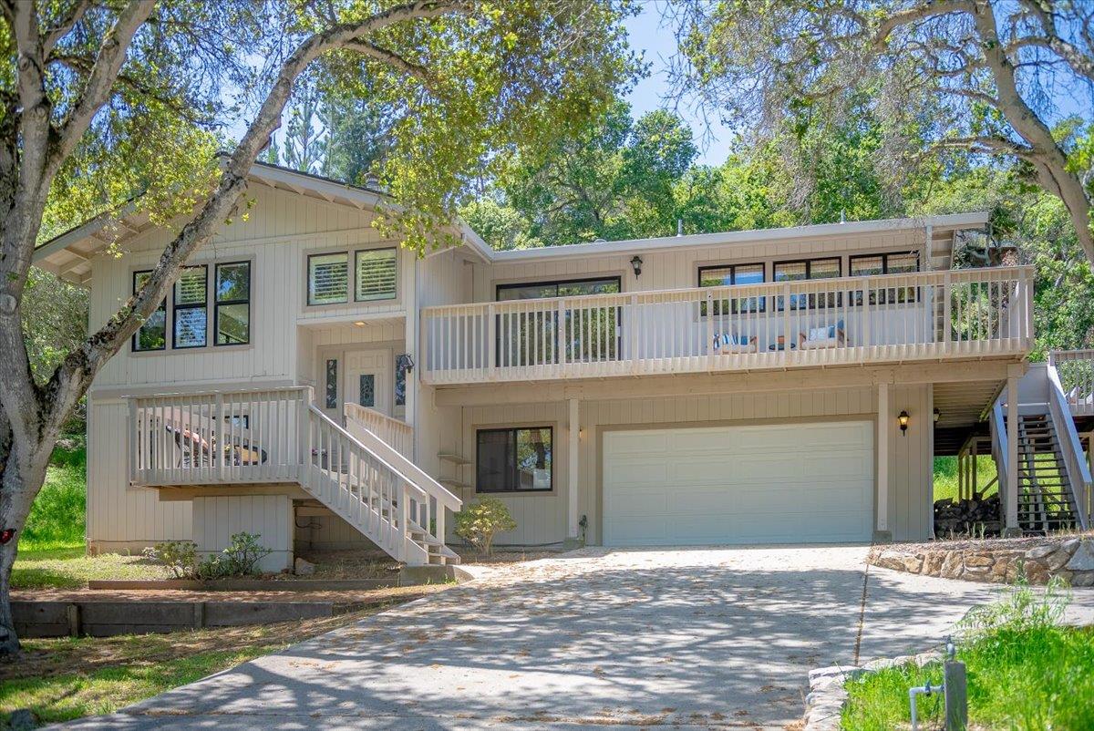 8935 Coker Road Salinas, CA 93907 - Photo 4 of 90 a front view of a house with a yard and garage