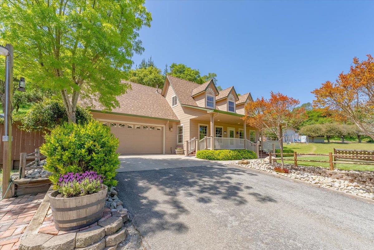 8935 Coker Road Salinas, CA 93907 - Photo 46 of 90 a view of a house with a yard and a fountain