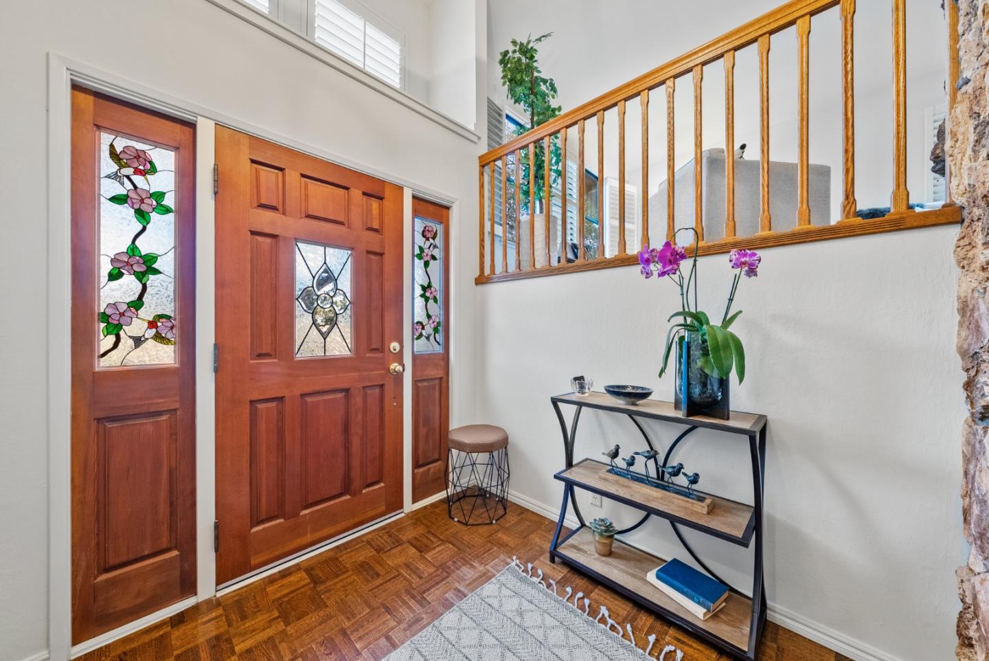 8935 Coker Road Salinas, CA 93907 - Photo 7 of 90 a view of an entryway with wooden floor and stairs
