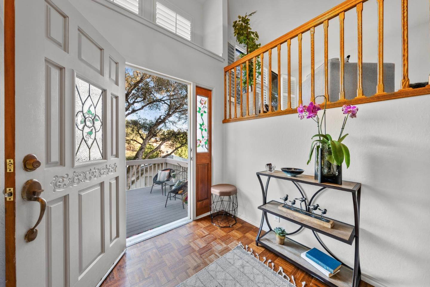 8935 Coker Road Salinas, CA 93907 - Photo 8 of 90 a view of staircase with wooden floor and a potted plant