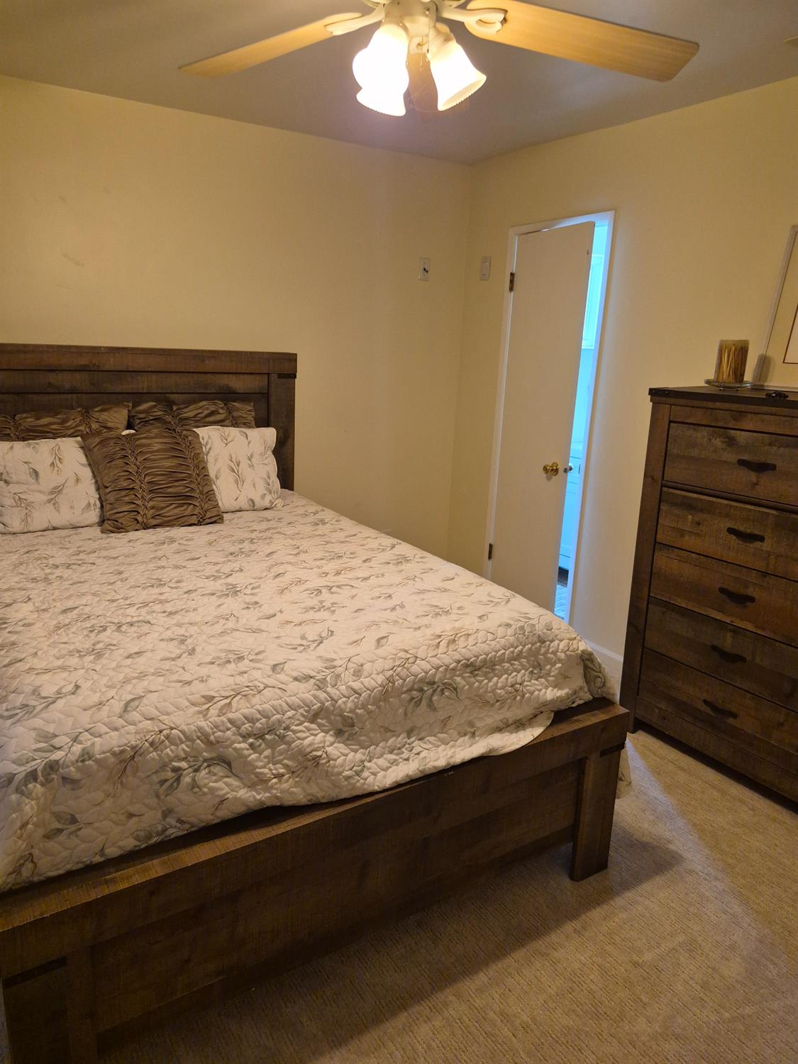 5817 Keyntel Street Citrus Heights, CA 95621 - Photo 15 of 30 a bed sitting in a bedroom next to a window