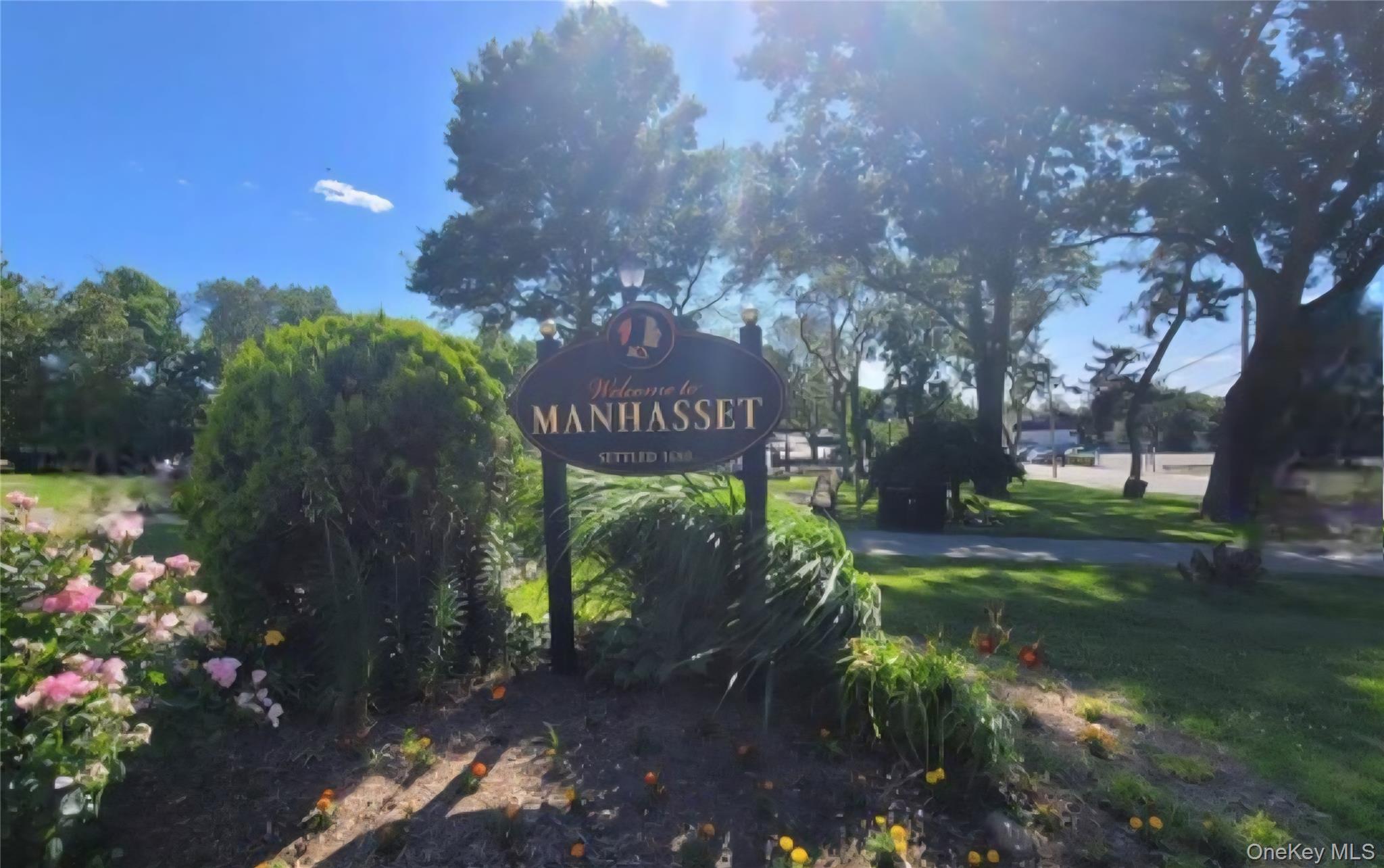 21-23 George Street Manhasset, NY 11030 - Photo 12 of 15 a sign that is sitting in the middle of a yard