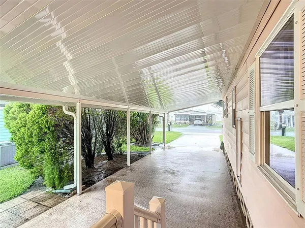 a view of porch with seating space