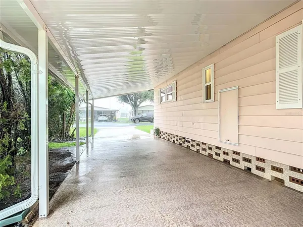 a view of a back yard of the house