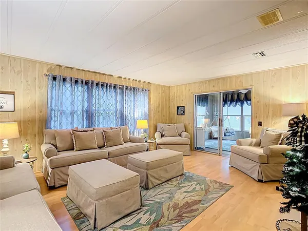 a living room with furniture and a couch