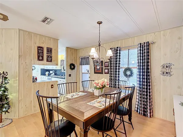 a view of a dining room with furniture