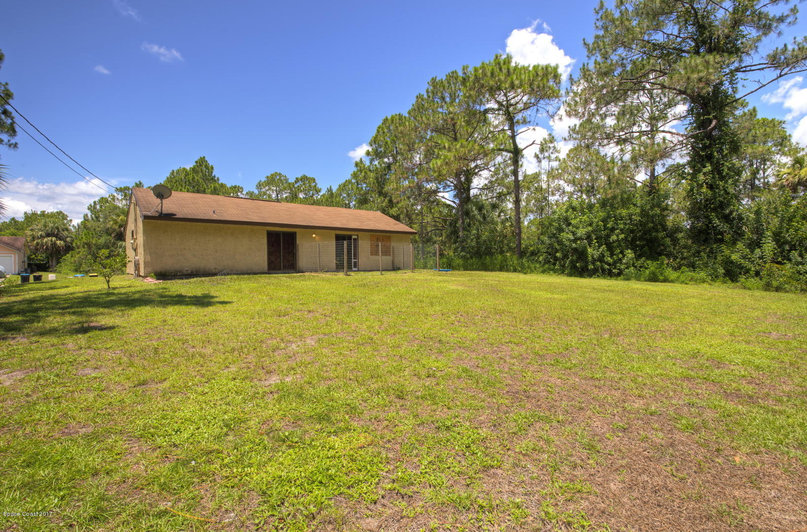 665 Weaver Road Southwest Palm Bay, FL 32908 - Photo 20 of 21 Backyard