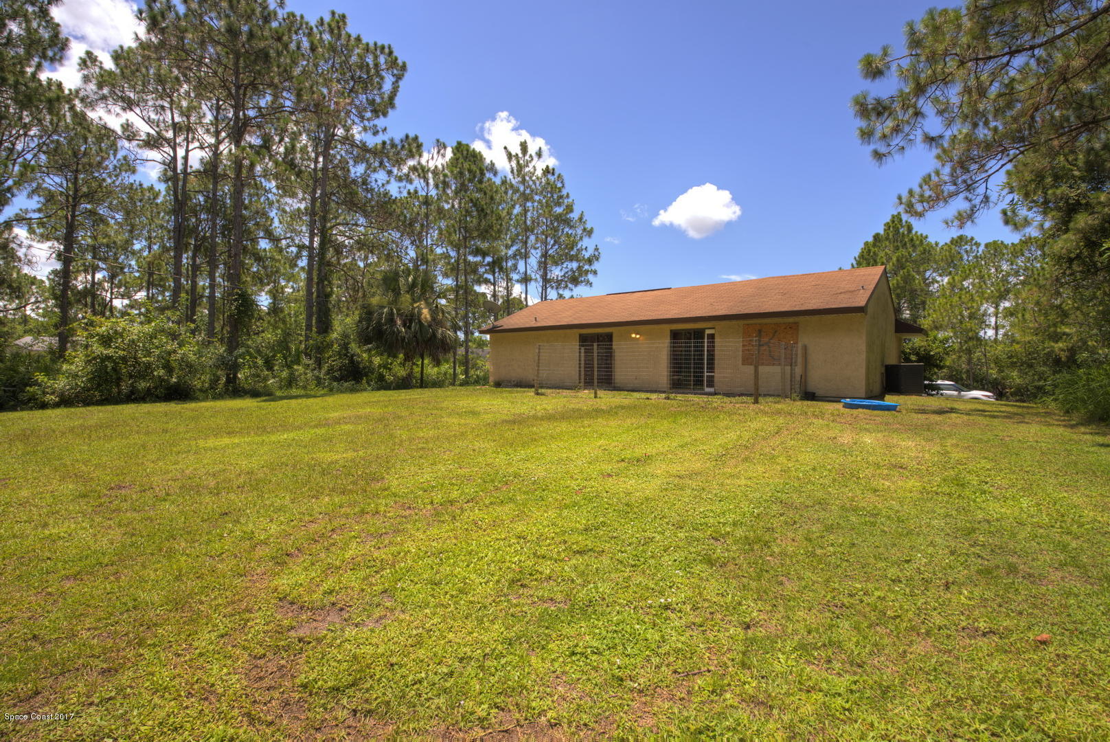 665 Weaver Road Southwest Palm Bay, FL 32908 - Photo 3 of 21 Rear View