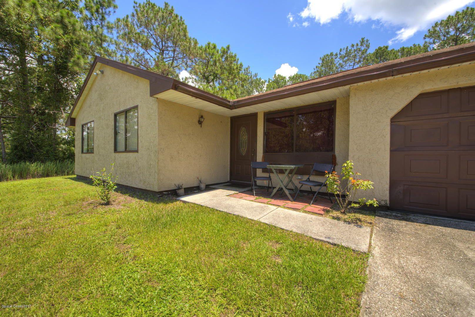 665 Weaver Road Southwest Palm Bay, FL 32908 - Photo 4 of 21 Covered Front Entry