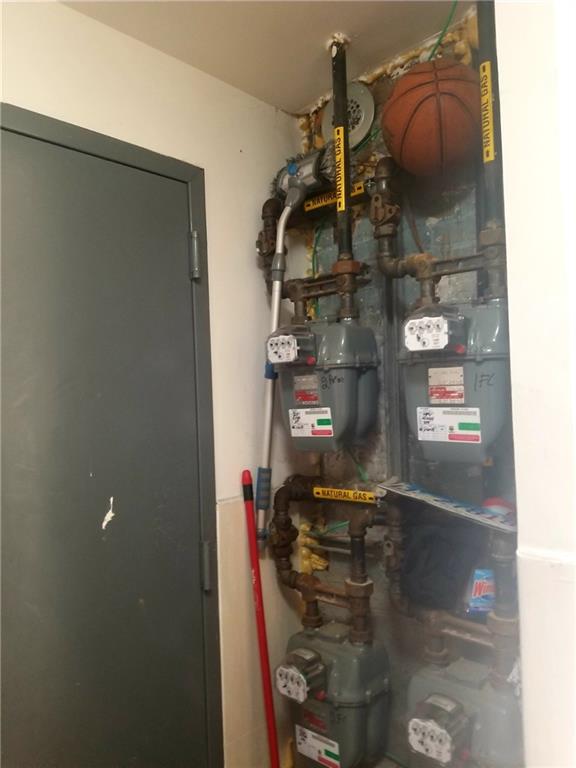 269 55th Street Brooklyn, NY 11220 - Photo 24 of 27 a close view of water heater room