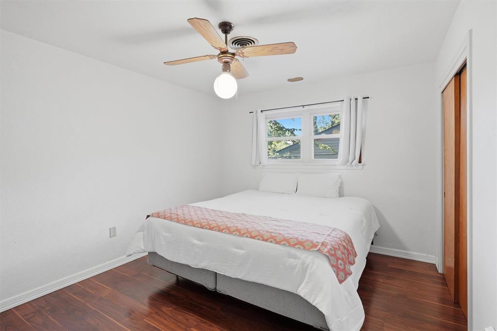 4105 Springbranch Drive Benbrook, TX 76116 - Photo 21 of 30 a bedroom with a bed and a window