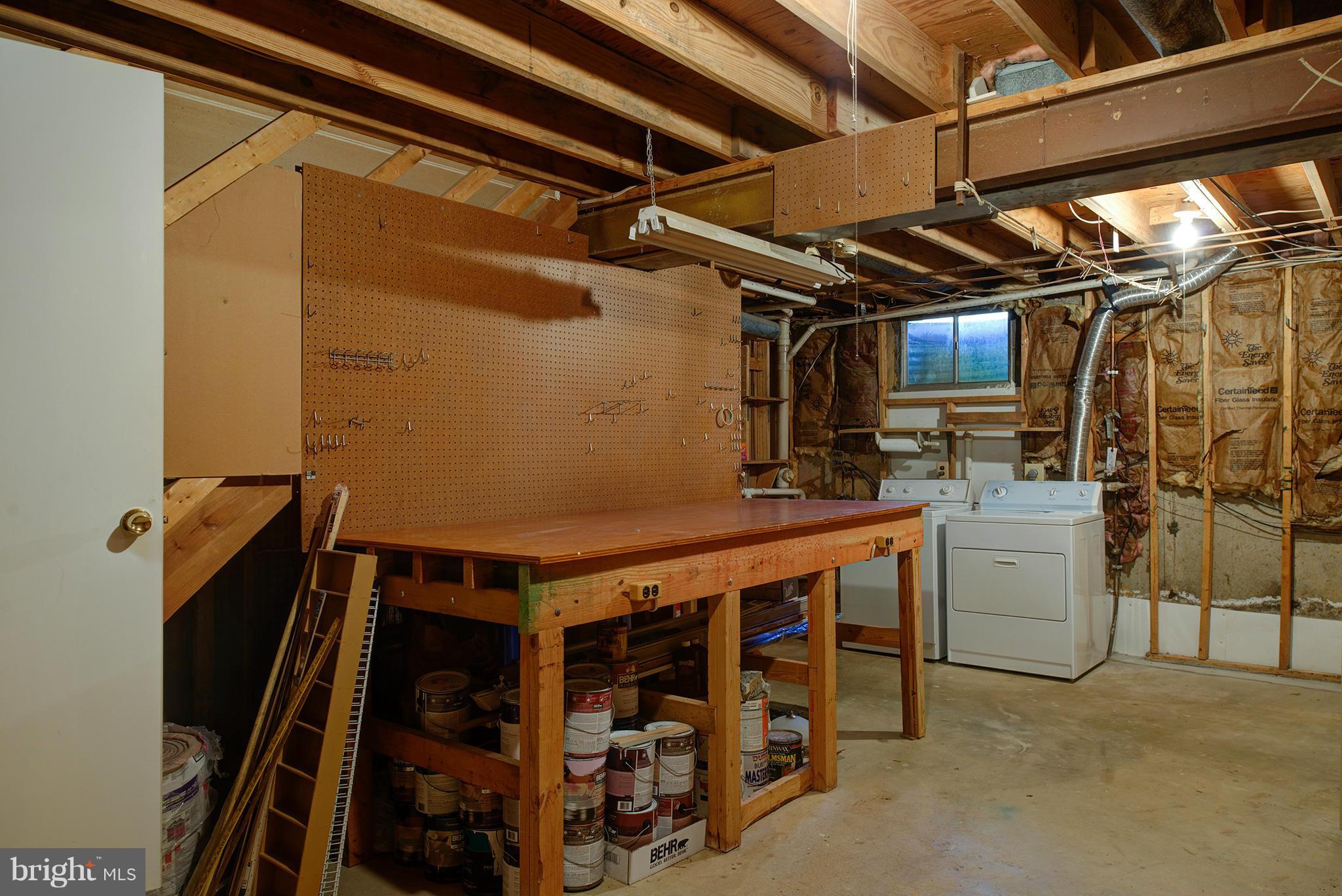 7610 Trail Run Road Falls Church, VA 22042 - Photo 24 of 29 Basement workshop, storage & laundry areas
