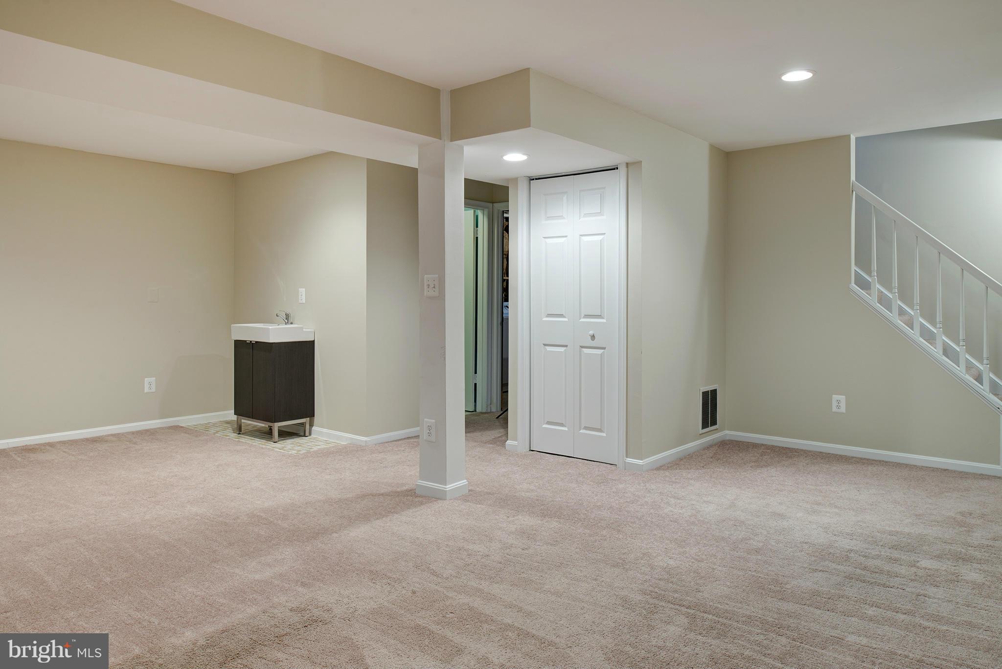 7610 Trail Run Road Falls Church, VA 22042 - Photo 4 of 29 Recreation room, full bath plus wet bar area