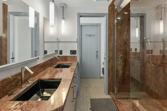 a kitchen with a sink and a refrigerator