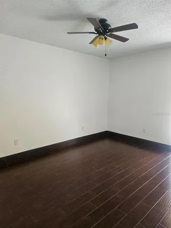 a bathroom with a toilet a sink and shower