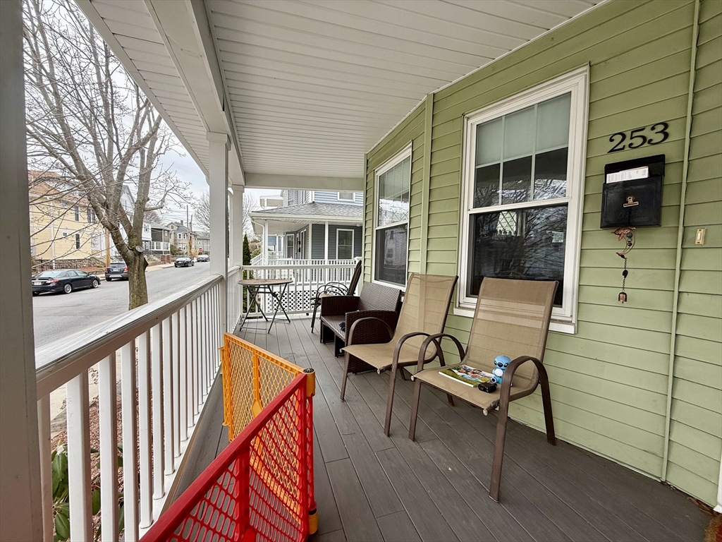 253 Brown Street, Unit 1 Waltham, MA 02453 - Photo 15 of 17 a view of a porch with furniture