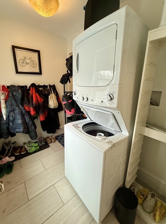 253 Brown Street, Unit 1 Waltham, MA 02453 - Photo 4 of 17 a utility room with dryer and washer