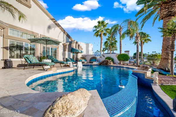 a bathroom with sinks granite countertop a sink and a mirror