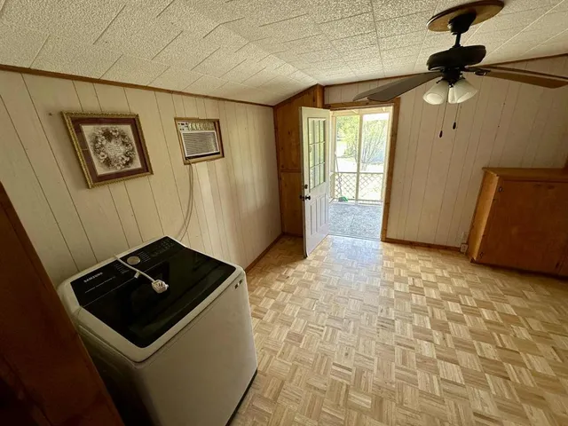 a kitchen with a sink and a refrigerator
