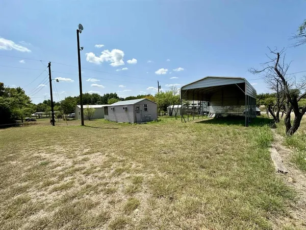 a view of a table and chairs in patio