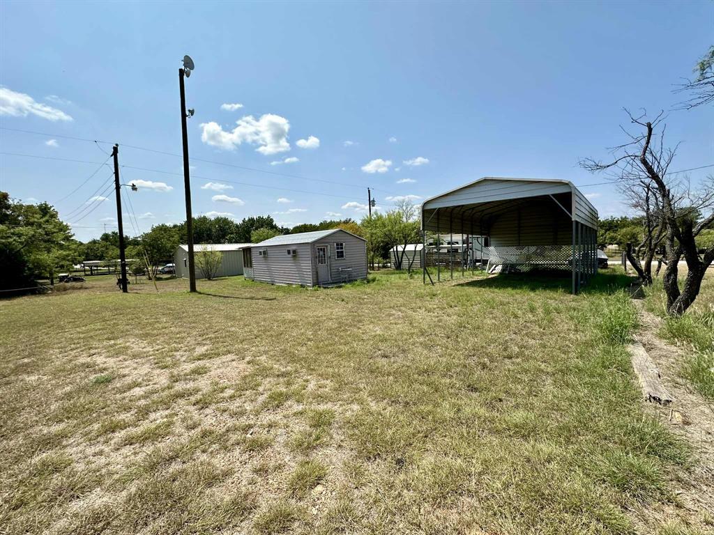 366 St Kitts Road Comanche, TX 76442 - Photo 2 of 20 a view of a table and chairs in patio
